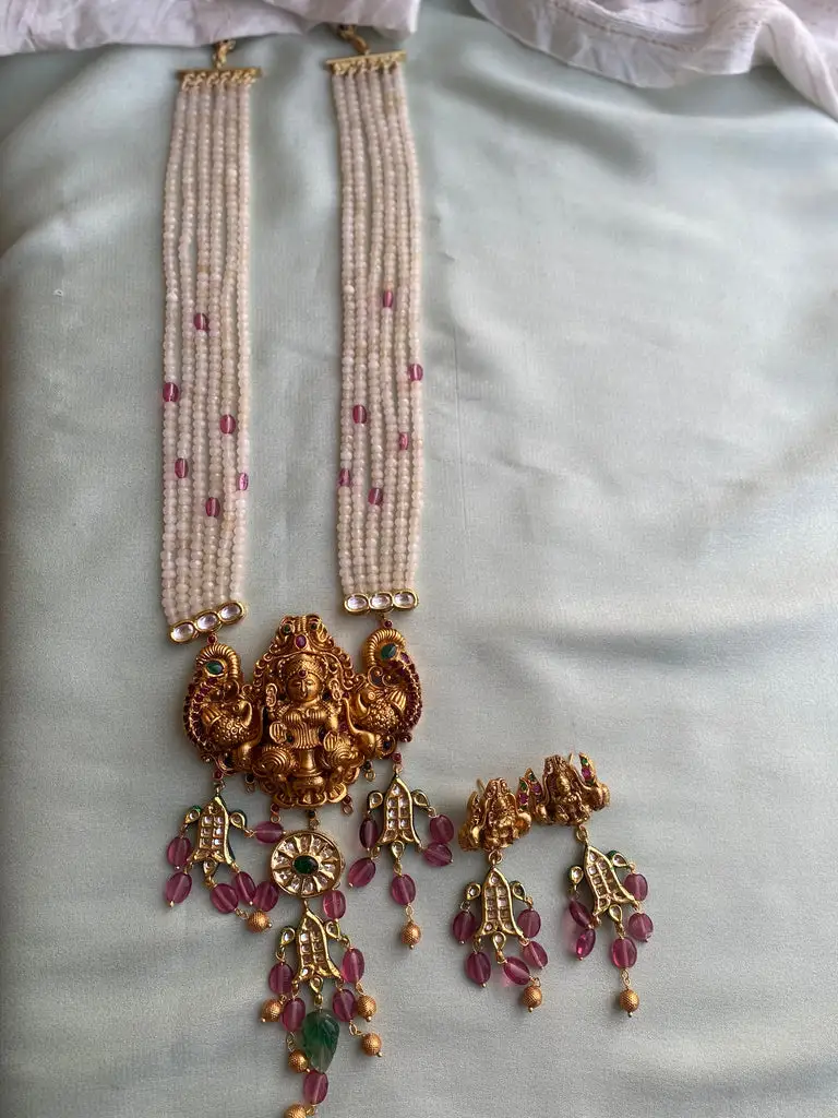 Designer Nagasi Pearl Haram with earrings